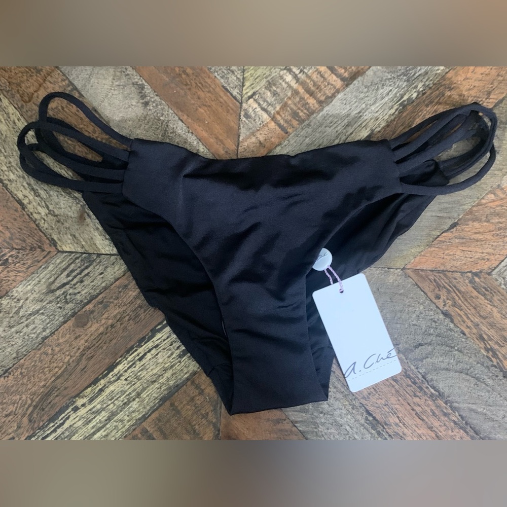 A.Che Graylin bikini bottom in black . Size small . NWT